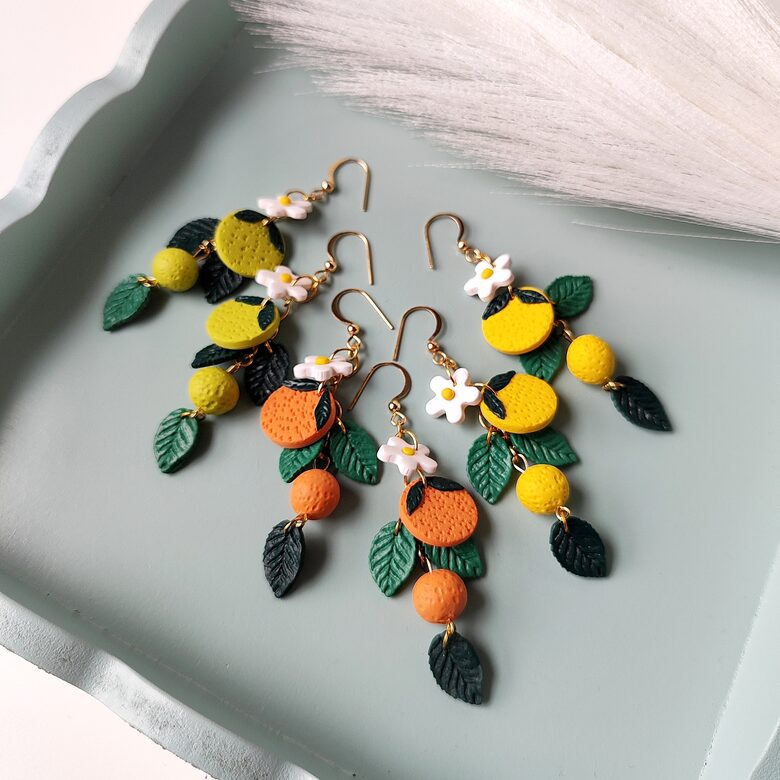 Long earrings with fruit design