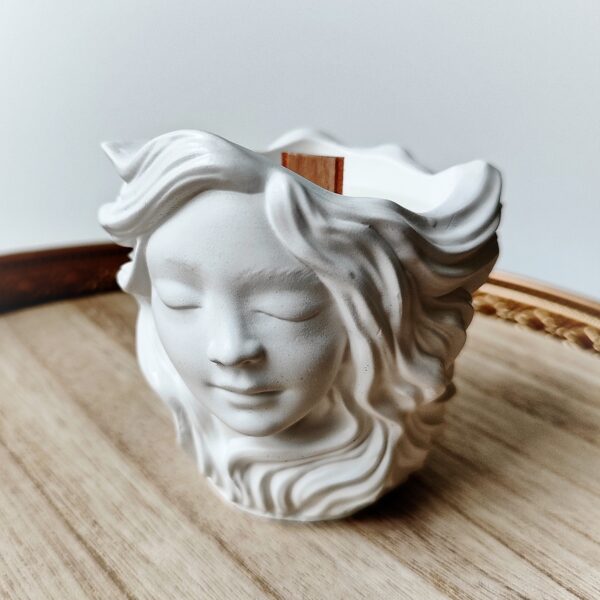 Goddess face soy wax candle in white gypsum pot